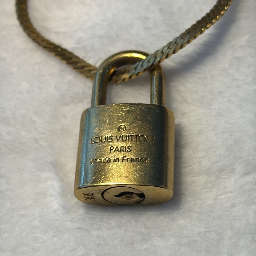 Louis Vuitton lock and key with Givenchy Gold Zipper Design Bracelet - Picture 6 of 7